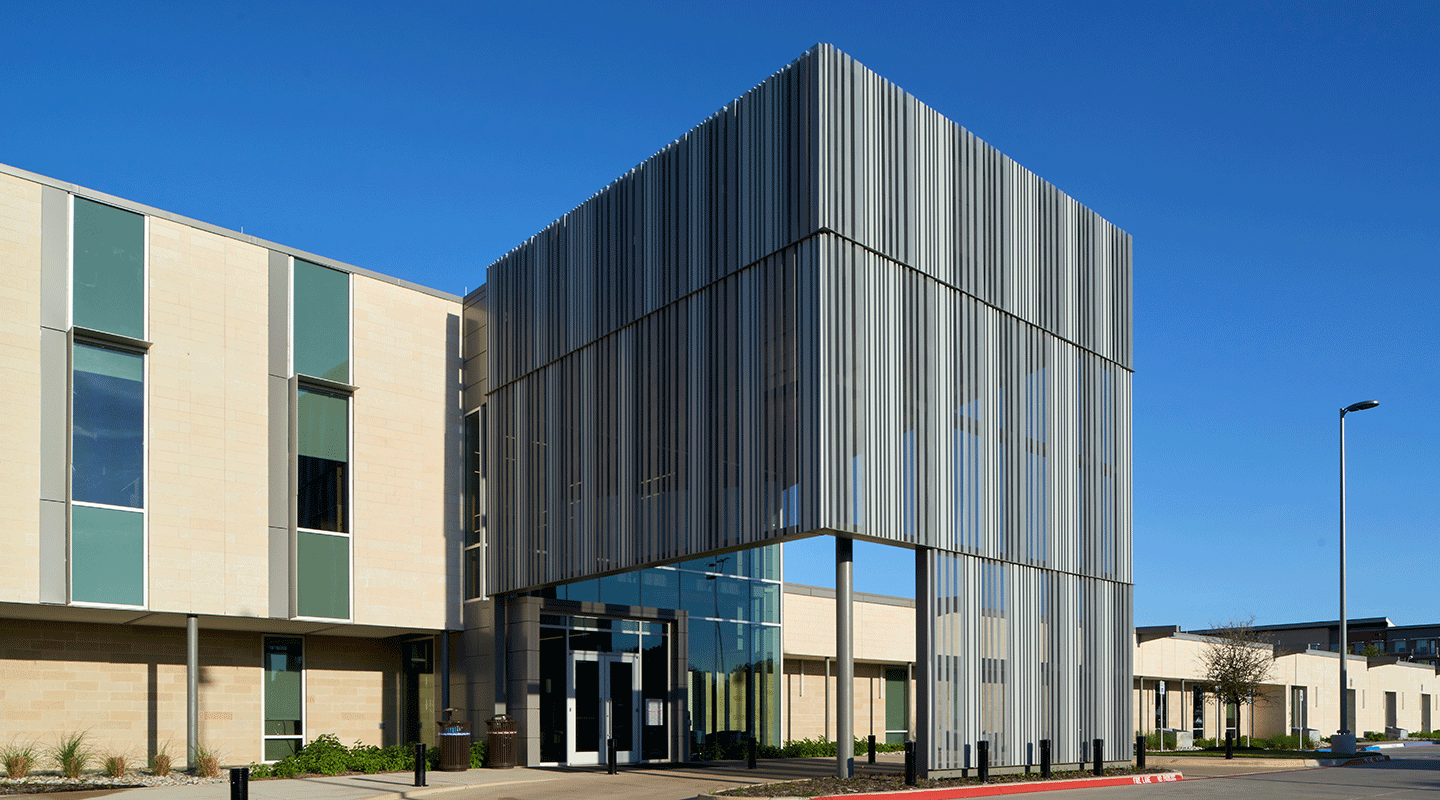 angled view of entrance with vertical gray panels